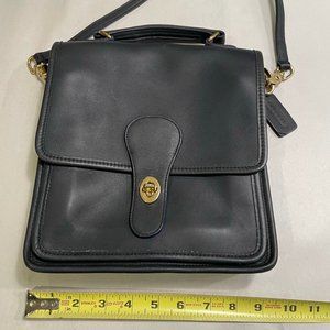 Coach dark blue cross body purse.